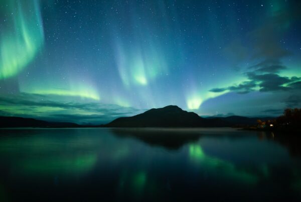 A beautiful aurora borealis at a lake